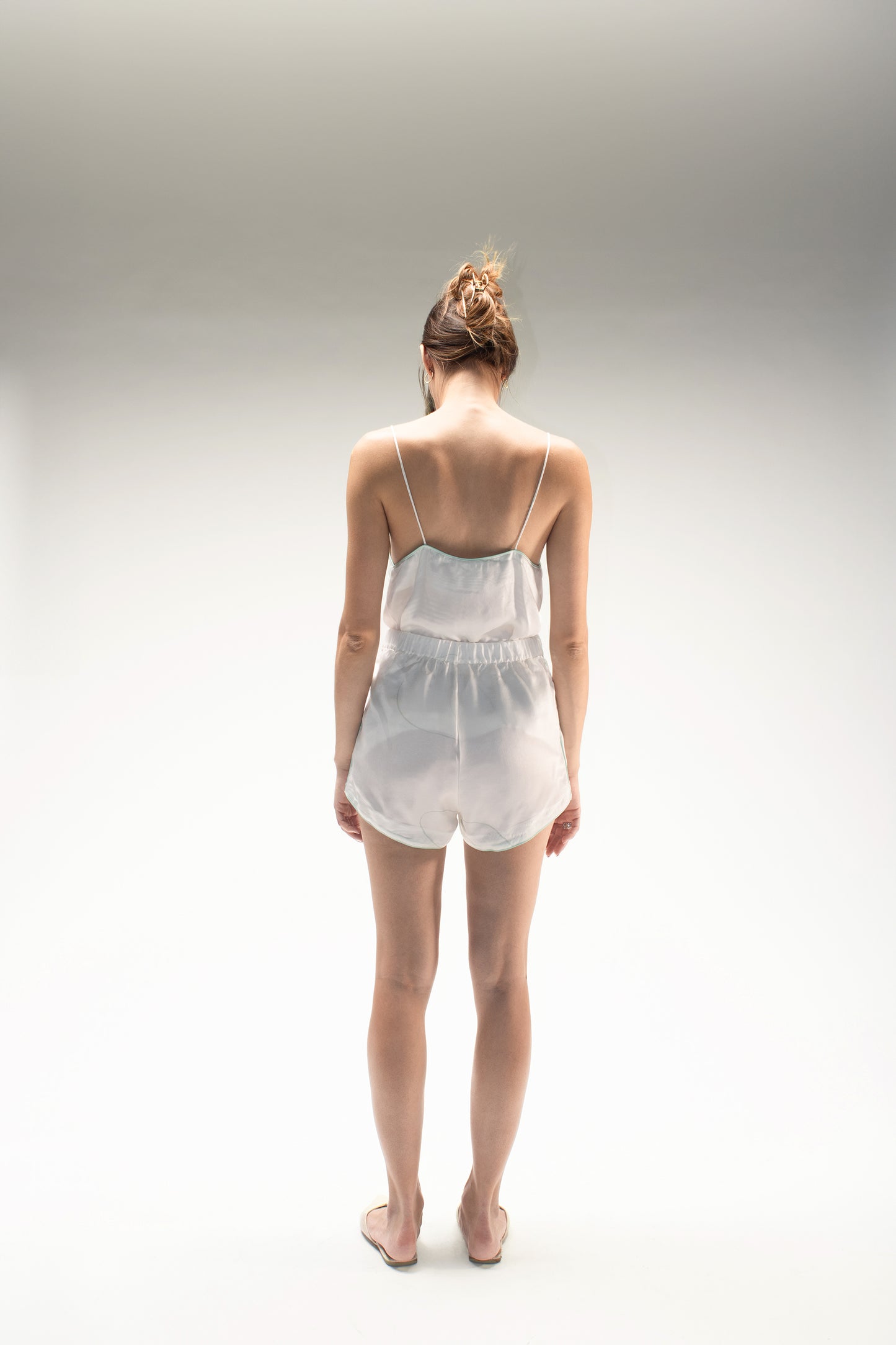 Shorts stampa "Risveglio" con elastico e piping a contrasto