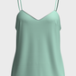 Top con scollo a V verde acqua con piping a contrasto