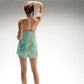 Top con scollo a V verde acqua con piping a contrasto